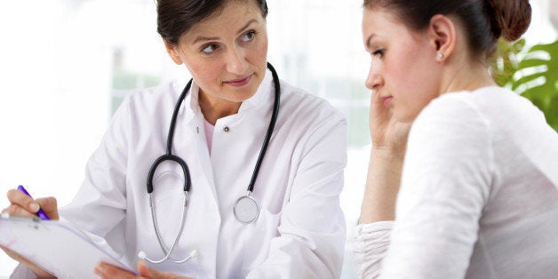 doctor explaining diagnosis to her female patientPlease see similar images here: