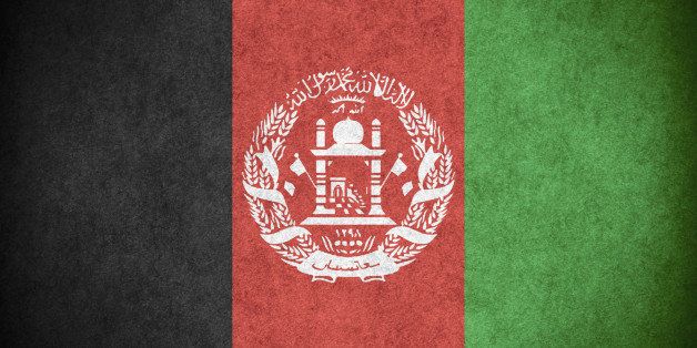 flag of Afghanistan or Afghan banner on paper rough pattern texture
