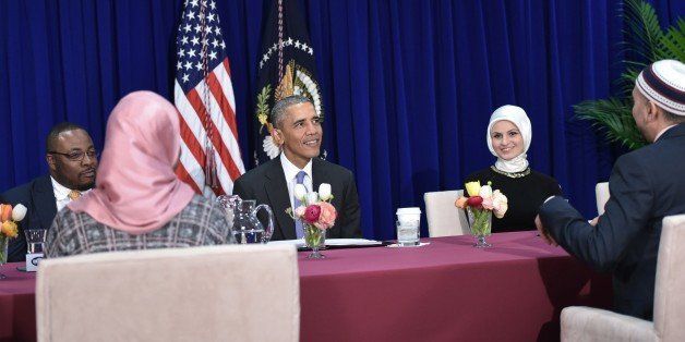 US President Barack Obama participates in a roundtable discussion with members of the Muslim community while visiting the Islamic Society of Baltimore February 3, 2016 in Windsor Mill, Maryland. Seven years into his presidency, Barack Obama made his first trip to an American mosque on February 4, offering a high-profile rebuttal of harsh Republican election-year rhetoric against Muslims. / AFP / MANDEL NGAN (Photo credit should read MANDEL NGAN/AFP/Getty Images)