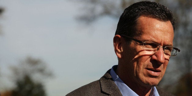 BRIDGEPORT, CT - NOVEMBER 04: Democratic Connecticut Governor Dan Malloy stops at a polling station on November 4, 2014 in Br