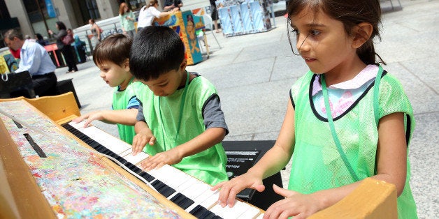 NEW YORK, NY - JUNE 06: Guests play a piano during The 2016 Sing For Hope Pianos launch event on June 6, 2016 in New York City. (Photo by Monica Schipper/Getty Images for The Sing for Hope Pianos )