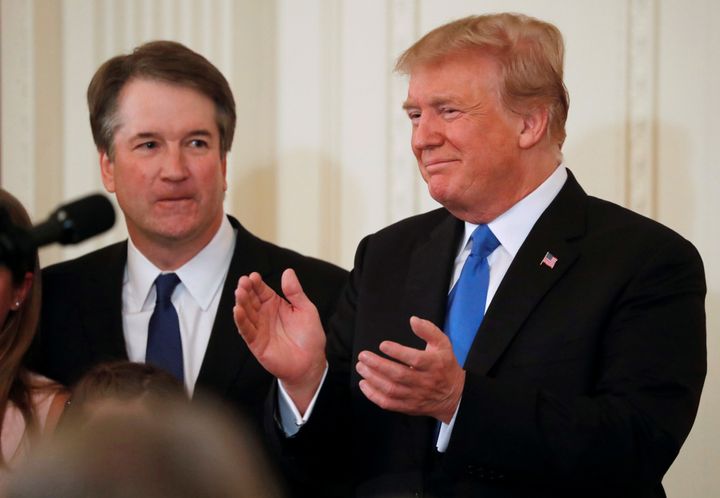 Trump applauds next to Kavanaugh, his nominee for the U.S. Supreme Court.