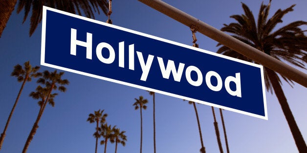 Hollywood redlight sign illustration over LA Palm trees background. Photomount