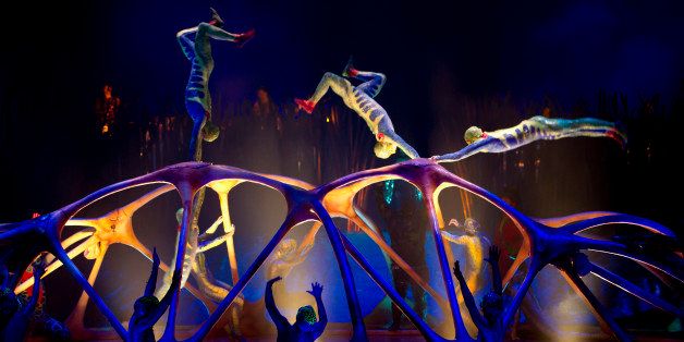 Members of the Canadian performance group, Cirque Du Soleil perform Totem at the Royal Albert Hall, London, Wednesday, Jan. 4, 2012. (AP Photo/Jonathan Short)