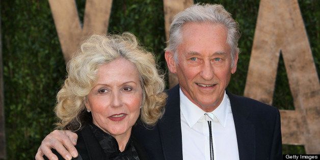 WEST HOLLYWOOD, CA - FEBRUARY 24: Artist Edward Ruscha (R) and wife Danna Ruscha attend the 2013 Vanity Fair Oscar Party at the Sunset Tower Hotel on February 24, 2013 in West Hollywood, California. (Photo by David Livingston/Getty Images)