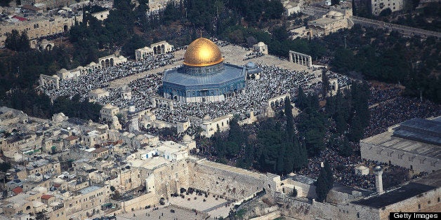 Friday prayer on Temple Mount with the Wailing wall and the Dome of the Rock, Aerial view, Jerusalem, Israel