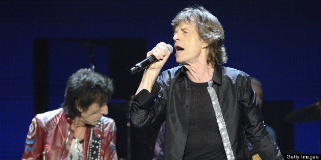 SAN JOSE, CA - MAY 8: Ronnie Wood (L) and Mick Jagger of The Rolling Stones perform in support of the bands' 50 & Counting Tour at HP Pavilion on May 8, 2013 in San Jose, California. (Photo by Tim Mosenfelder/Getty Images)