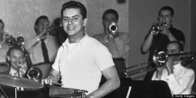 circa 1955: Full-length image of American bandleader and Latin jazz musician Tito Puente (1923 - 2000) playing percussion during a performance. (Photo by Frank Driggs Collection/Getty Images)