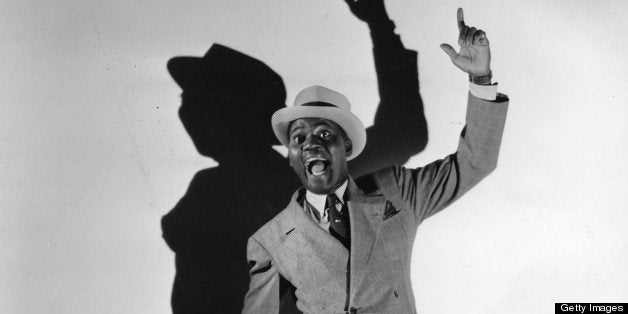 Legendary tap dancer Bill 'Bojangles' Robinson (1878 - 1949) and his shadow perform on stage in New York in 1941. (Photo by Mark Rucker/Transcendental Graphics, Getty Images) 