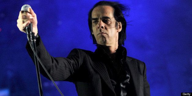 INDIO, CA - APRIL 14: Musician Nick Cave of the band Nick Cave and the Bad Seeds performs onstage during day 3 of the 2013 Coachella Valley Music & Arts Festival at the Empire Polo Club on April 14, 2013 in Indio, California. (Photo by Kevin Winter/Getty Images for Coachella)