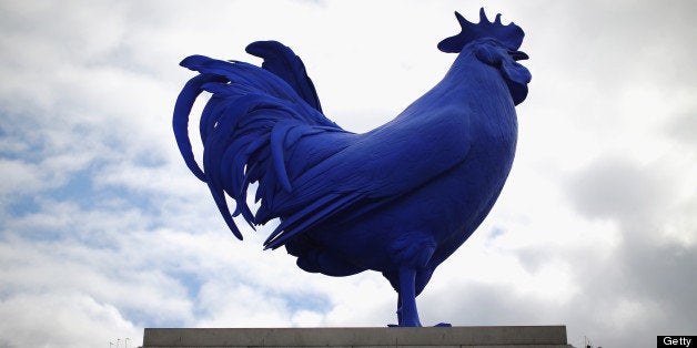 LONDON, ENGLAND - JULY 25: A blue French cockerel by German artist Katharina Fritsch is unveiled on top of the forth plinth in Trafalgar Square on July 25, 2013 in London, England. The five-metre high fibreglass giant blue French cockerel was installed as the ninth sculpture to occupy the vacant Fourth Plinth in Trafalgar Square. (Photo by Dan Kitwood/Getty Images)