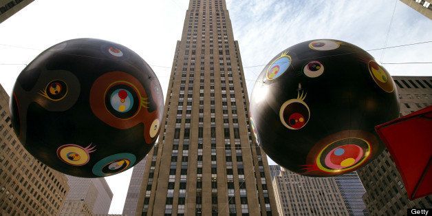 NEW YORK - SEPTEMBER 12: Two large ballons hang over Rockefeller Center September 12, 2003 in New York City. Designed by artist Takashi Murakami, the Reversed Double Helix will be on display until October 12, 2003. (Photo by Spencer Platt/Getty Images) 