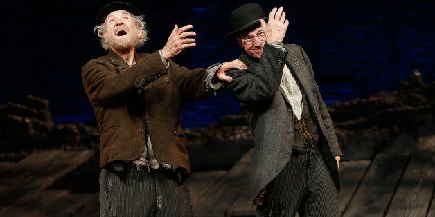 NEW YORK, NY - NOVEMBER 24: Actors Ian McKellen and Patrick Stewart perform a dance during curtain call at the opening night of 'Waiting For Godot' at the Cort Theatre on November 24, 2013 in New York City. (Photo by J. Countess/Getty Images)
