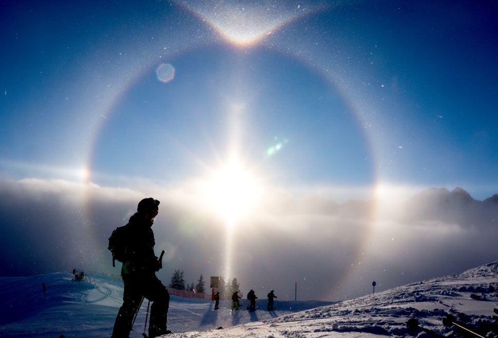 The sun creates a halo over skiers at Fellhorn on January 15, 2014 in Obers...