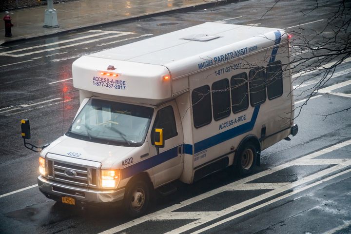 An Access-A-Ride vehicle waits for a passenger during inclement weather in New York City's Chelsea neighborhood on Feb. 22, 2018.