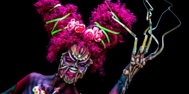 POERTSCHACH AM WOERTHERSEE, AUSTRIA - JULY 05: (EDITORS NOTE: Image contains partial nudity) A model poses at the World Bodypainting Festival 2014 on July 5, 2014 in Poertschach am Woerthersee, Austria. (Photo by Jan Hetfleisch/Getty Images)