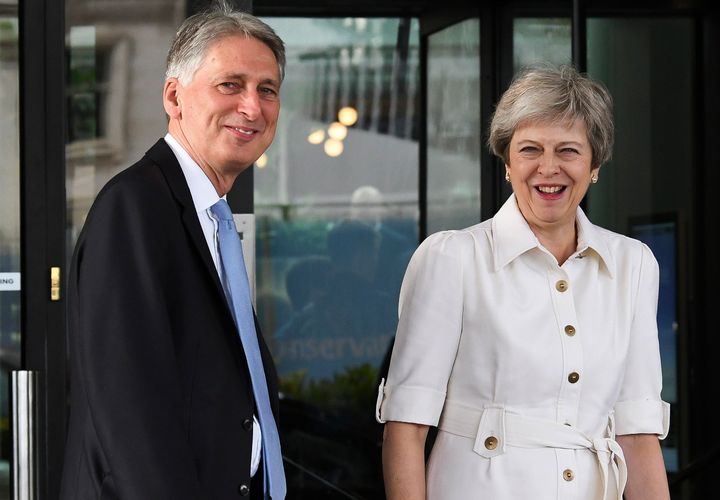 Philip Hammond and Theresa May at the Birmingham conference