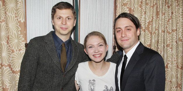 In this Thurs., Sept. 11, 2014 photo provided by Starpix, stars of the Broadway production âThis is Our Youth,â from left, Michael Cera, Tavi Gevinson and Kieran Culkin, stop for a photo at the premiereâs after party in New York. (AP Photo/Starpix, Amanda Schwab)