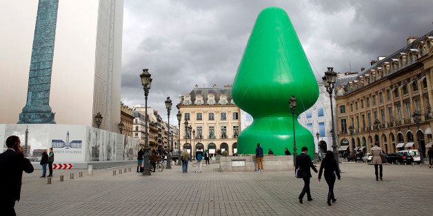 PARIS, FRANCE - OCTOBER 17: A view of 'Tree', Paul Mc Carthy's monumental artwork which has been erected at Place Vendome on October 17, 2014 in Paris, France. This installation is part of the FIAC 'Contemporary Art Fair'. The artwork has raised eyebrows in the French capital because if it's uncanny resemblance to a certain type of sex toy. (Photo by Chesnot/Getty Images)
