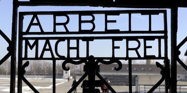 GERMANY - FEBRUARY 22: GERMANY, DACHAU, Concentration camp memorial place Dachau, O,p,s, Gate of the former concetration camp Dachau with the writing sign Arbeit macht frei - Work Brings Freedom. (Photo by Ulrich Baumgarten via Getty Images)