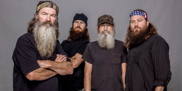 This 2012 photo released by A&E shows, from left, Phil Robertson, Jase Robertson, Si Robertson and Willie Robertson from the A&E series, "Duck Dynasty." The A&E channel says "Duck Dynasty" patriarch Phil Robertson is off the show indefinitely after condemning gays as sinners in a magazine interview. In a statement Wednesday, Dec. 18, 2013, A&E said it was extremely disappointed to read Robertson's comments in GQ magazine. (AP Photo/A&E, Zach Dilgard)