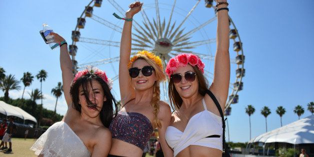 INDIO, CA - APRIL 20: Music fans attend day 3 of the 2014 Coachella Valley Music & Arts Festival at the Empire Polo Club on April 20, 2014 in Indio, California. (Photo by Frazer Harrison/Getty Images for Coachella)