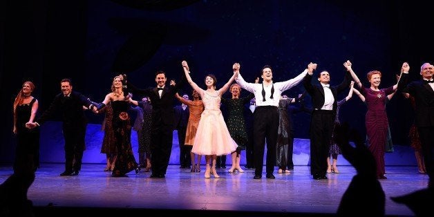 Cast members of musical show 'An American in Paris' take a curtain call on the conclusion of the opening night performance at the Palace Theater in New York on April 12, 2015. 'An American in Paris' -- a modernized version of the 1951 Oscar-winning film, tells the romance between a beguiling French waitress and a former American soldier working to rebuild their lives after the horrors of World War II. AFP PHOTO/JEWEL SAMAD (Photo credit should read JEWEL SAMAD/AFP/Getty Images)