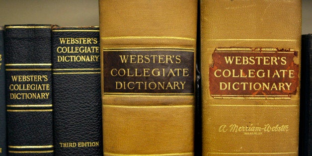 Archive copies of the Collegiate Dictionary rest on a bookshelf at the headquarters of the Merriam-Webster dictionary publisher in Springfield, Mass., Wednesday July 1, 2009. (AP Photo/Charles Krupa)