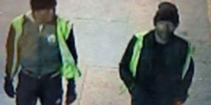 Federal authorities say two unidentified men stole hundreds of guns from a UPS facility.