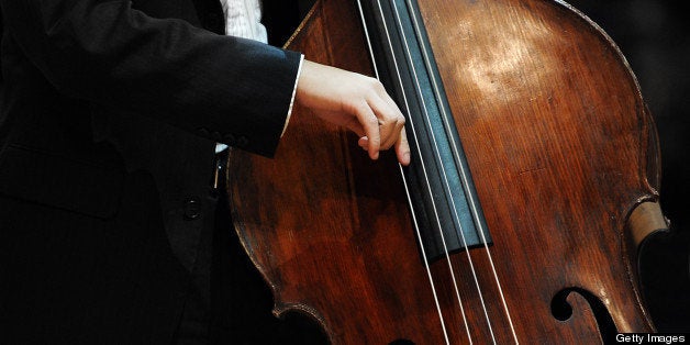 Musician playing cello.