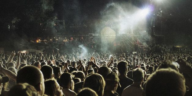 Music concert and crowd. Shot at 1600 iso, grainyâ¦. still print very nicely
