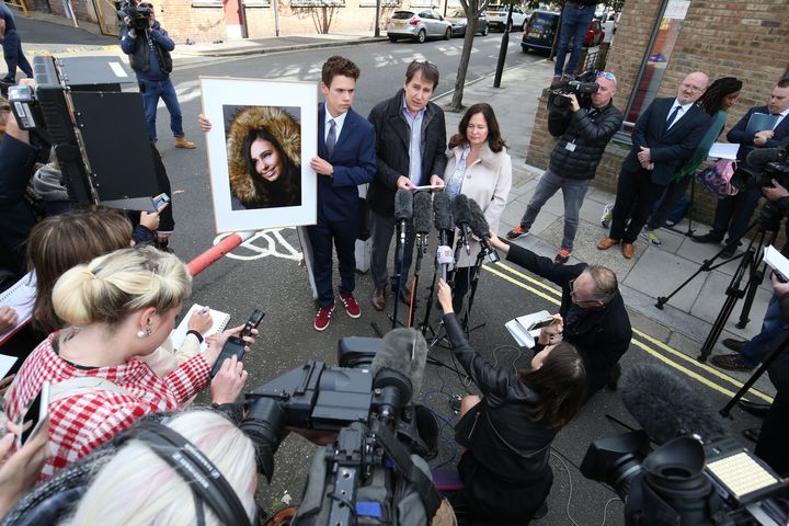 Nadim and Tanya Ednan-Laperouse, with their son Alex, speaking to the press outside West London Coroners Court on Friday.