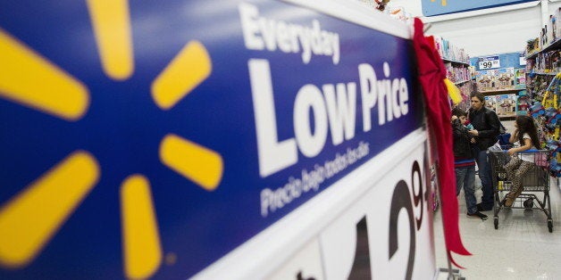 Shoppers look at merchandise at a Walmart store in Secaucus, New Jersey, November 11, 2015. REUTERS/Lucas Jackson