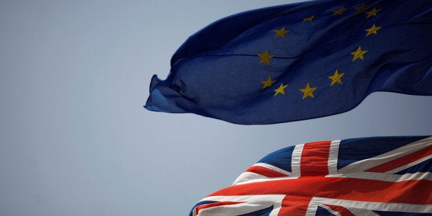 The Union Jack (bottom) and the European Union flag are seen flying, at the border of Gibraltar with Spain, in the British overseas territory of Gibraltar, historically claimed by Spain, June 27, 2016, after Britain voted to leave the European Union in the EU Brexit referendum. REUTERS/Jon Nazca