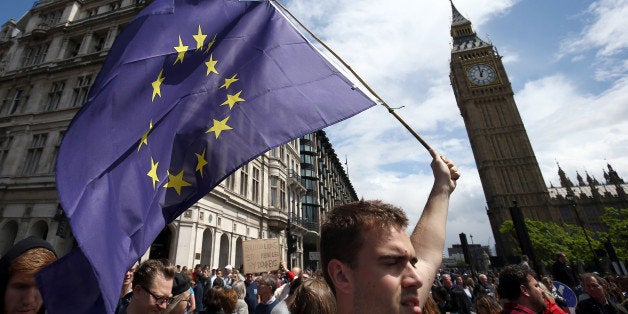 People hold banners during a 'March for Europe' demonstration against Britain's decision to leave the European Union, in Parliament Square, in central London, Britain July 2, 2016. Britain voted to leave the European Union in the EU Brexit referendum. REUTERS/Neil Hall 