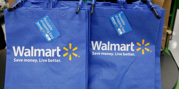 FILE - In this Thursday, Sept. 19, 2013, file photo, reusable shopping bags are offered for sale at a Wal-Mart Neighborhood M