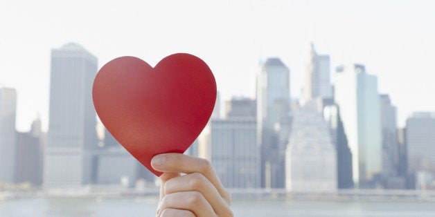 USA, New York State, New York City, Manhattan, Hand holding heart shape