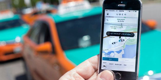 TORONTO, ON - MAY 14 -Photographed at The CNE, Toronto, Uber taxi service is a new way to travel around the city. Request and payment are all made using an app. (Bernard Weil/Toronto Star via Getty Images)