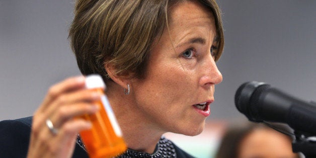 BOSTON - SEPTEMBER 1: Attorney General Maura Healey holds a CVS prescription bottle as she announced in a first-in-the-nation