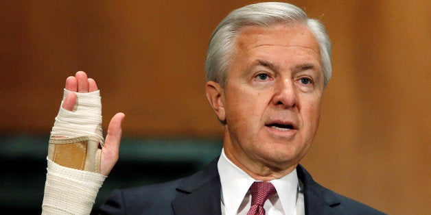 FILE PHOTO -- Wells Fargo CEO John Stumpf testifies before a Senate Banking Committee hearing on the firm's sales practices