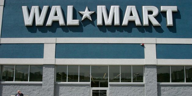 Businessman Talking on Cell Phone Outside Wal-Mart
