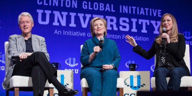 From L-R: Former U.S. President Bill Clinton, Former Secretary of State Hillary Clinton, and Vice Chair of the Clinton Foundation Chelsea Clinton, discuss the Clinton Global Initiative University during the closing plenary session on the second day of the 2014 Meeting of Clinton Global Initiative University at Arizona State University in Tempe, Arizona March 22, 2014. REUTERS/Samantha Sais (UNITED STATES - Tags: POLITICS EDUCATION)