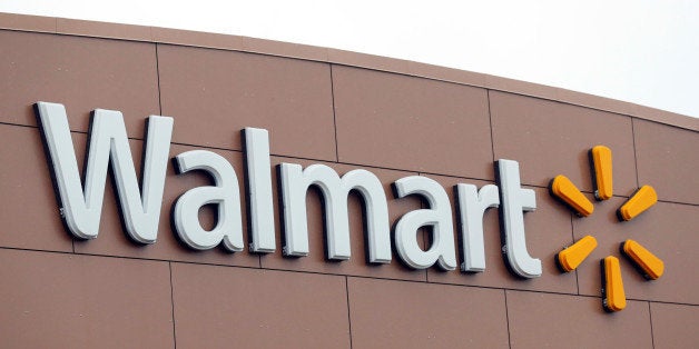 Walmart signage is displayed outside a company's store in Chicago, Illinois, U.S. November 23, 2016. REUTERS/Kamil Krzaczynski