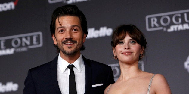 Actors Diego Luna and Felicity Jones pose as they arrive at the world premiere of the film "Rogue One: A Star Wars Story" in Hollywood, California, U.S., December 10, 2016. REUTERS/Mario Anzuoni TPX IMAGES OF THE DAY