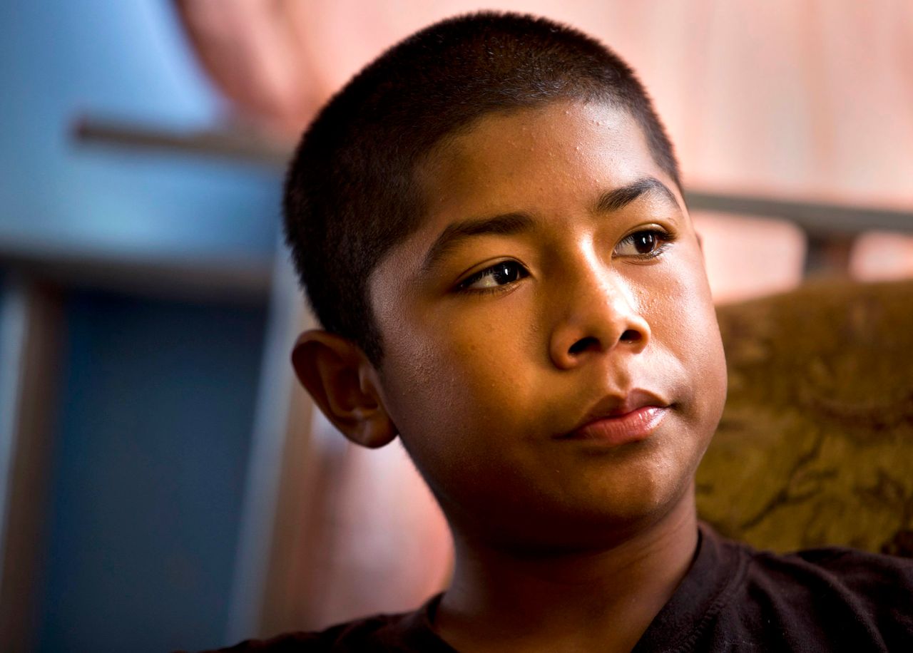 Cesar, 13, in his Santa Ana apartment in August 2018.