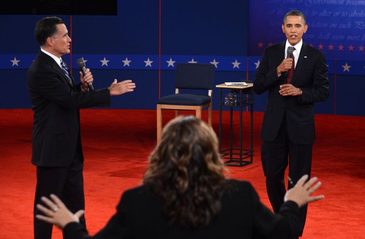 CNN's Candy Crowley (C) conducts the second presidential debate with US President Barack Obama (R) and Republican presidential candidate Mitt Romney (L) at the David Mack Center at Hofstra University in Hempstead, New York, October 16, 2012. AFP PHOTO / Saul LOEB (Photo credit should read SAUL LOEB/AFP/Getty Images)