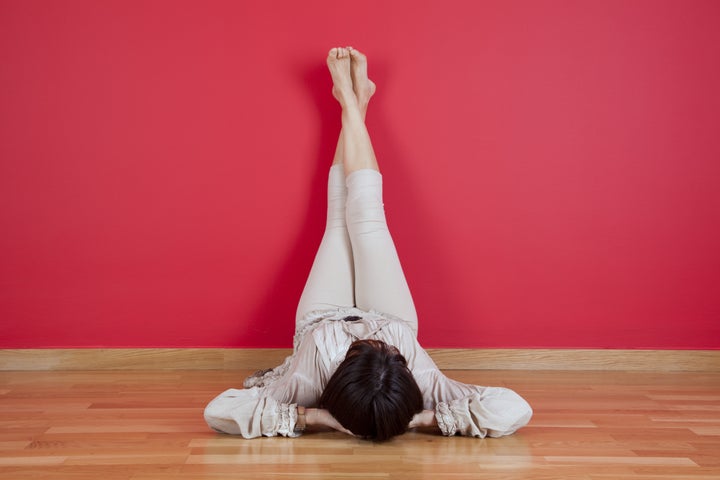 woman laying on the floor of...