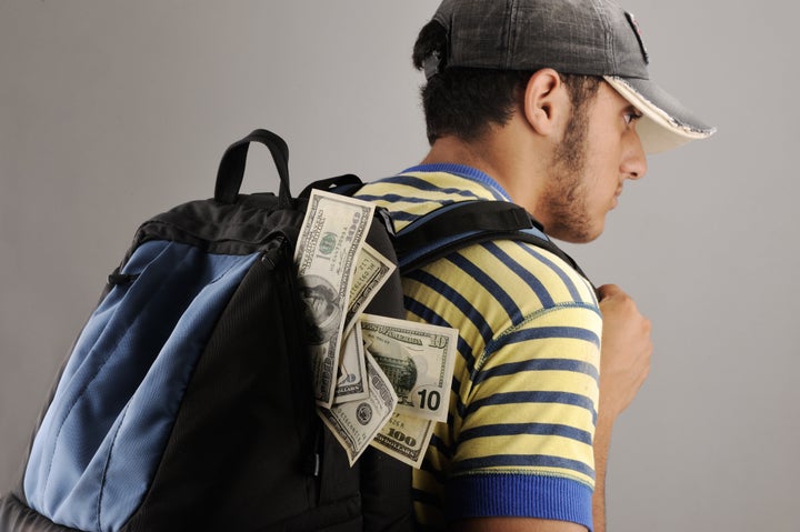 young arabic man with backpack...