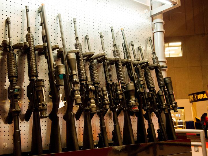A wall of semi-automatic rifles is seen at the National Rifle Association (NRA) Annual Meetings and Exhibits April 14, 2012 in St. Louis, Missouri. AFP PHOTO / Karen BLEIER (Photo credit should read KAREN BLEIER/AFP/Getty Images)