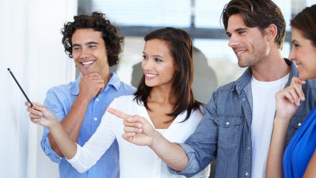 a group of young businesspeople ...